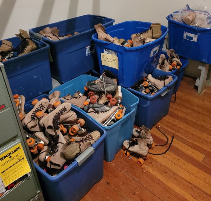 Bins of skates needing repair