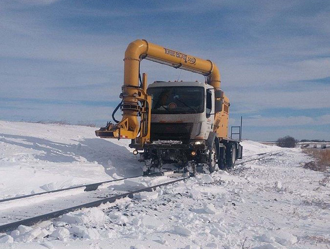 When the snow is dry, a blower can remove top layers.